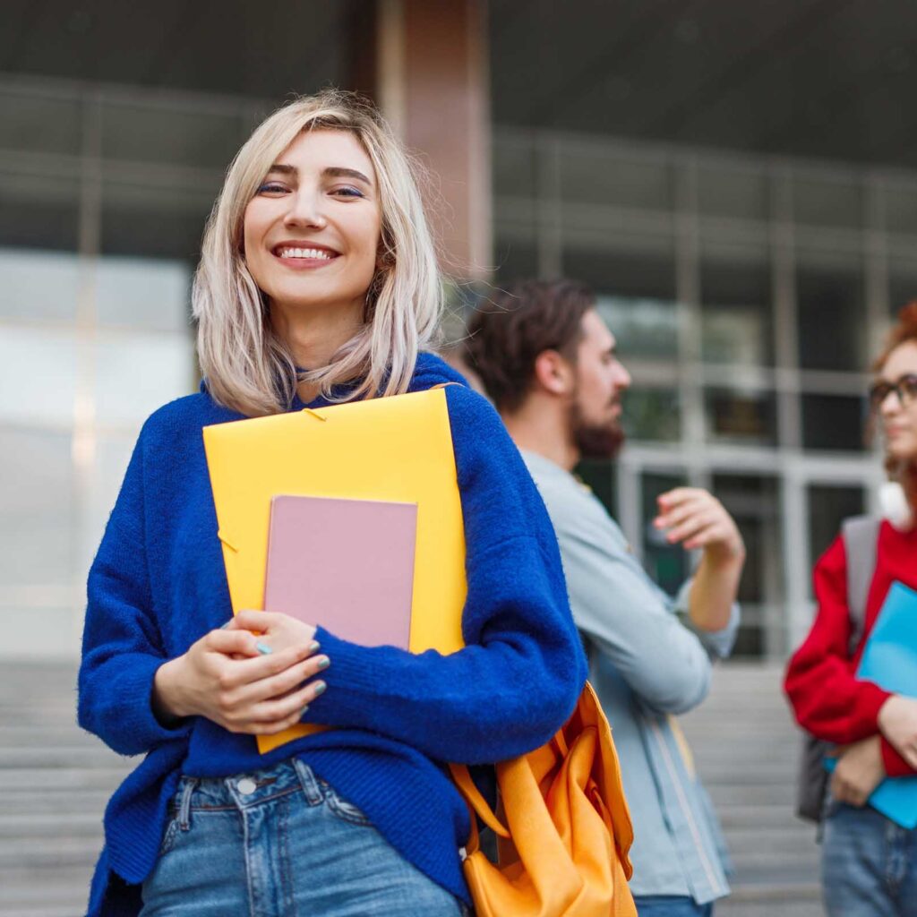 Cheerful young woman applying to university